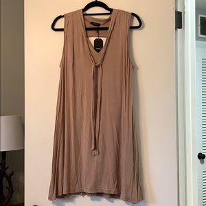 Light brown sleeveless dress